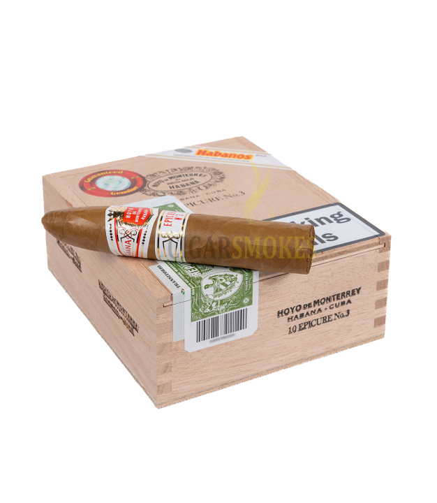 smokes cigar on top